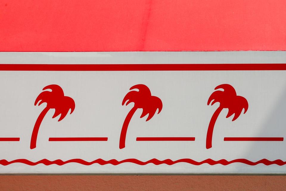 The iconic palm tree design of In-N-Out at a location in Baldwin Park.