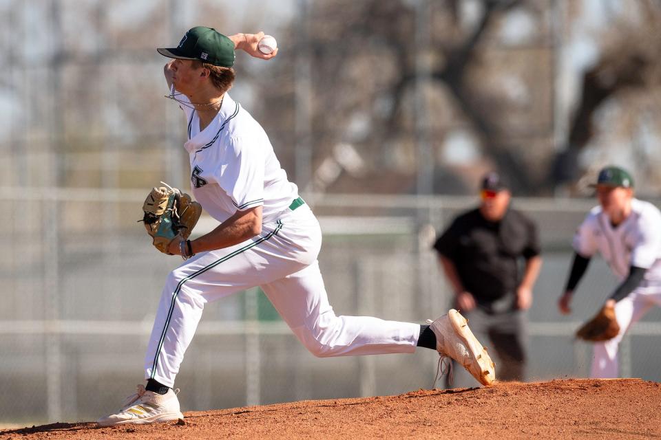 Fossil Ridge's Easton Miller pitches during a city rivalry baseball game against Fort Collins on Tuesday at Fossil Ridge High School in Fort Collins.