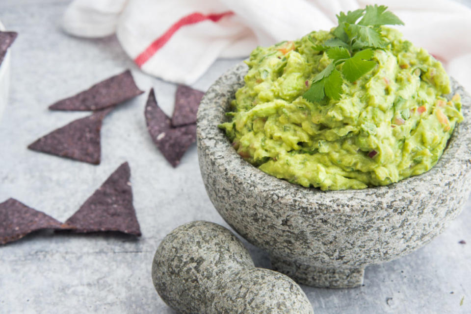 <p>Sense & Edibility</p><p>Use hass avocados to create this creamy, versatile dip. Serve with warm corn tortilla chips.</p><p><strong>Get the recipe: </strong><a href="https://senseandedibility.com/guacamole/" rel="nofollow noopener" target="_blank" data-ylk="slk:Chunky Guacamole Dip;elm:context_link;itc:0;sec:content-canvas" class="link ">Chunky Guacamole Dip</a></p>