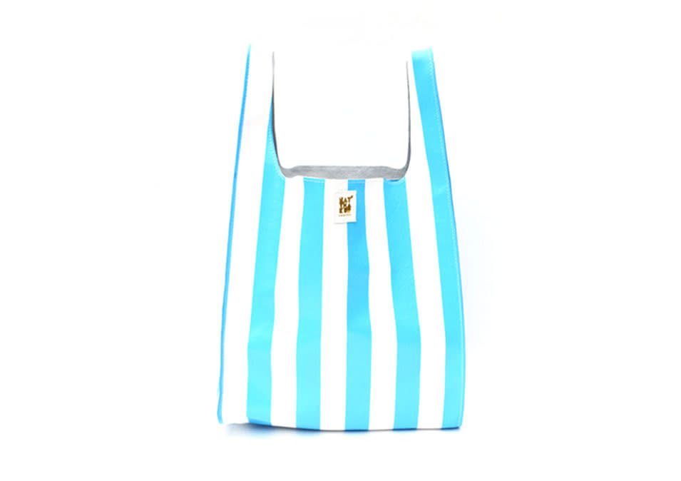 <p>Natalie Thakur leather striped grocery bag in blue or red stripe, $199, <a href="http://www.natthakur.com/collections/bags/products/leather-striped-grocery-bag" rel="nofollow noopener" target="_blank" data-ylk="slk:natthakur;elm:context_link;itc:0;sec:content-canvas" class="link ">natthakur</a></p>