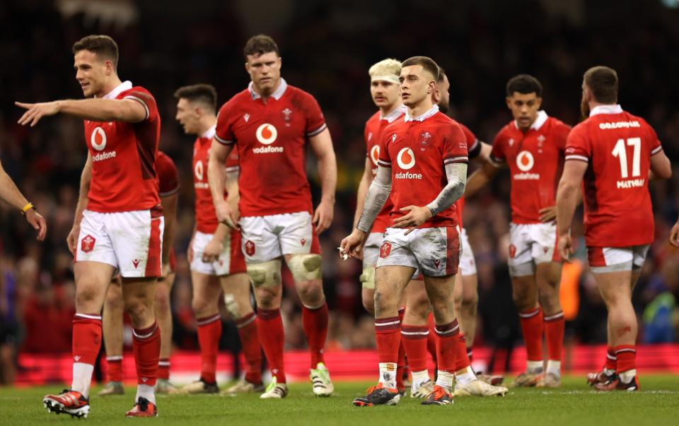 Wales' Cameron Winnett and teammates look dejected after the team's defeat during the Guinness Six Nations 2024 match between Wales and Italy at the Principality Stadium on March 16, 2024 in Cardiff, Wales