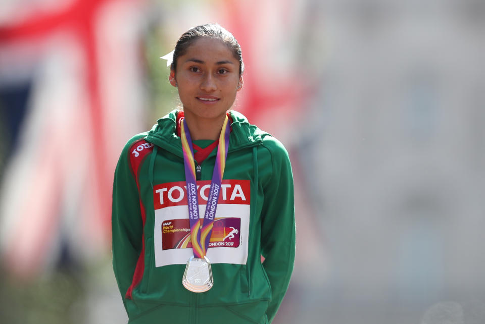 Silver medallist Mexico's Maria Guadalupe Gonzalez poses on the podium during the victory ceremony for the women's 20km race walk athletics event at the 2017 IAAF World Championships on The Mall in central London on August 13, 2017. / AFP PHOTO / Daniel LEAL-OLIVAS        (Photo credit should read DANIEL LEAL-OLIVAS/AFP via Getty Images)