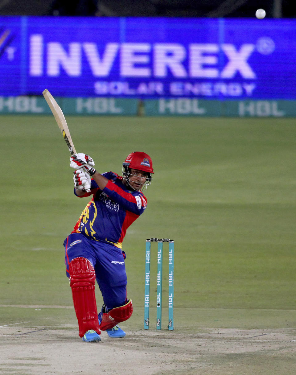 Karachi Kings' Sharjeel Khan plays a shot during a Pakistan Super League T20 cricket match between Karachi Kings and Lahore Qalandars at the National Stadium, in Karachi, Pakistan, Sunday, Feb. 28, 2021. (AP Photo/Fareed Khan)