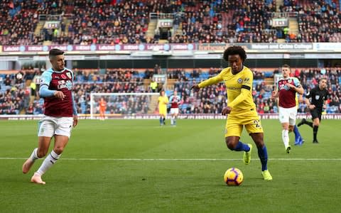 Matthew Lowton of Burnley and Willian of Chelsea during the Premier League match between Burnley FC and Chelsea - Credit: GETTY IMAGES