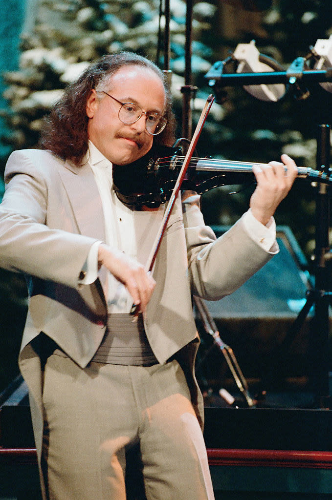 Roth playing violin