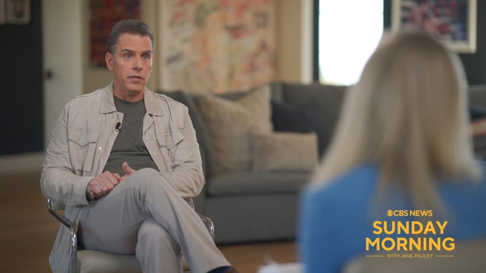 Hunter Biden sits for an interview with legs crossed at the knee
