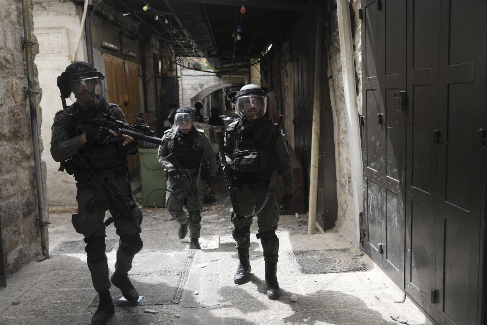 Israeli police is deployed in the Old City of Jerusalem, Sunday, April 17, 2022. Israeli police clashed with Palestinians outside Al-Aqsa Mosque after police cleared Palestinians from the sprawling compound to facilitate the routine visit of Jews to the holy site and accused Palestinians of stockpiling stones in anticipation of violence. (AP Photo/Mahmoud Illean)