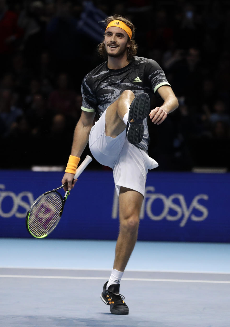 Stefanos Tsitsipas of Greece celebrates winning match point against Roger Federer of Switzerland during their ATP World Tour Finals semifinal tennis match at the O2 Arena in London, Saturday, Nov. 16, 2019. (AP Photo/Kirsty Wigglesworth)