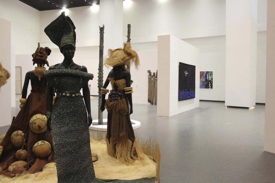 In this photo taken Thursday, Dec. 20, 2018, The Museum of Black Civilizations is seen during the inauguration in Dakar, Senegal. The new museum in Dakar is the latest sign that welcoming spaces across the continent are being prepared. Focusing on Africa and its diaspora, it has been decades in the making. (AP Photo/Amelia Nierenberg)