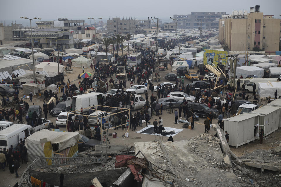 Displaced Palestinians arrive at a makeshift tent camp in Rafah, Gaza Strip, on Thursday, Dec. 28, 2023. (AP Photo/Hatem Ali)