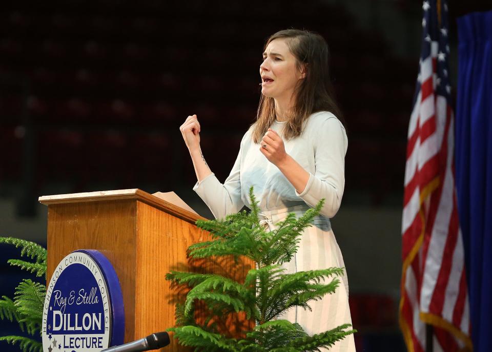 Amanda Knox speaks on Nov. 9 at the Hutchinson Sports Arena at Hutchinson Community College in Hutchinson, Kansas. At this point in her speech, Knox relives the time she was released from an Italian prison and heard other inmates yell out to her "libertà," the Italian word for liberty, in support of her release.