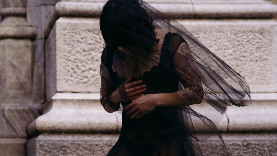 Fran Tirado poses outside St. Patrick's Cathedral before the funeral. - Laura Oliverio/CNN