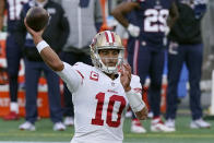 San Francisco 49ers quarterback Jimmy Garoppolo passes against the New England Patriots in the first half of an NFL football game, Sunday, Oct. 25, 2020, in Foxborough, Mass. (AP Photo/Steven Senne)