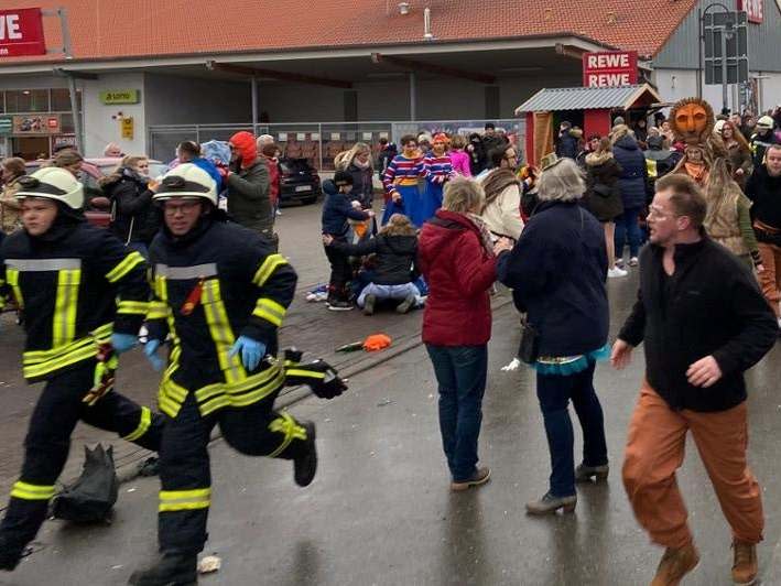 People react at the scene after a car ploughed into a carnival parade injuring several people in Volkmarsen, Germany: REUTERS