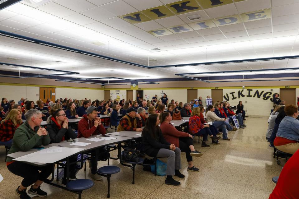 Teachers and community members fill the seats in the cafeteria, calling upon members of the Hopewell Area School Board to agree to contract negotiations during their meeting at Hopewell Junior High School on March 28, 2023.