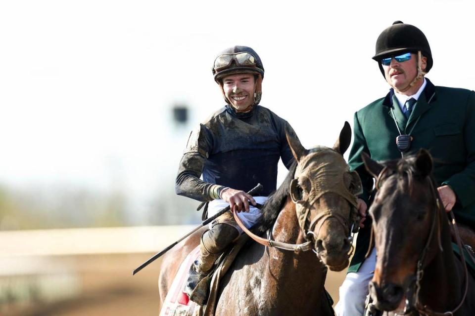 Tyler Gaffalione celebrates winning the 100th edition of Toyota Blue Grass Stakes, a 200-point Kentucky Derby qualifier with on Sierra Leone during the second day the the Keeneland Spring Meet at Keeneland Race Course in Lexington, Ky, Saturday, April 6, 2024.