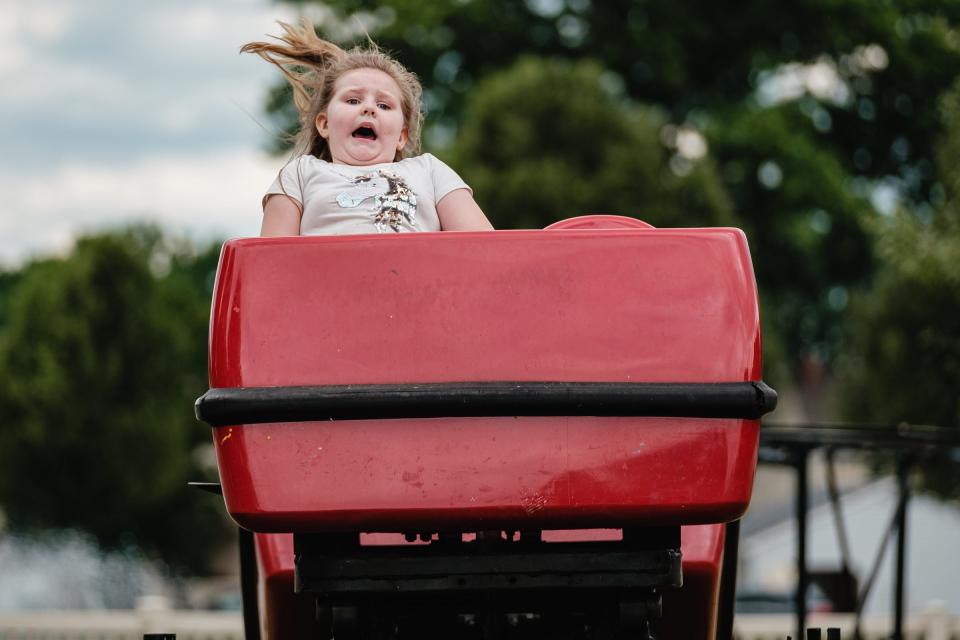 Amber Aurora Skelly from Beach City, enjoyed the roller coaster during the 2021 First Town Days Festival at Tuscora Park. TIMES-REPORTER/ANDREW DOLPH