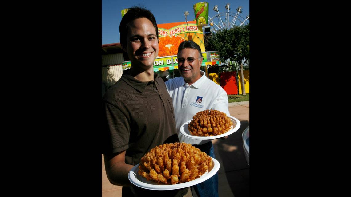 Jeff Pardini, left, and his dad Jim Pardini, sold their Onion Blossom at The Big Fresno Fair in this Fresno Bee file photo from 2011. Today, Pardini’s Catering company is the exclusive caterer for all the convention enter events and sells the food at Fresno State football games. It handles alcohol at the fair, and provides food at the horse races.