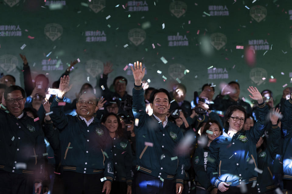 Democratic Progressive Party candidate Lai Ching-te, with Bi-khim Hsiao by his side, celebrates with supporters in Taipei, Taiwan, Saturday, Jan. 13, 2024. The Ruling-party candidate emerged victorious in Taiwan's presidential election on Saturday and his opponents conceded, a result that will chart the trajectory of the self-ruled democracy's relations with China over the next four years.(AP Photo/Louise Delmotte)