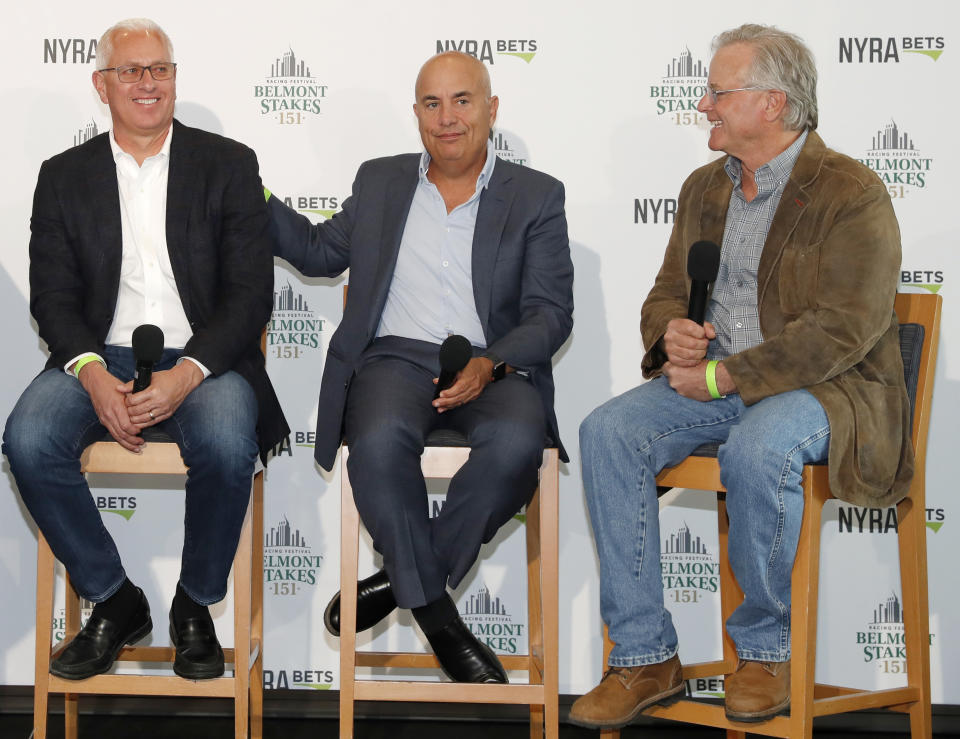 From left, Intrepid Heart and Spinoff trainer Todd Pletcher, left, sits beside War of Will trainer Mark Casse, center, and Tacitus trainer Bill Mott during a press conference following a draw ceremony for the 2019 Belmont Stakes race, Tuesday, June 4, 2019, in New York. (AP Photo/Kathy Willens)