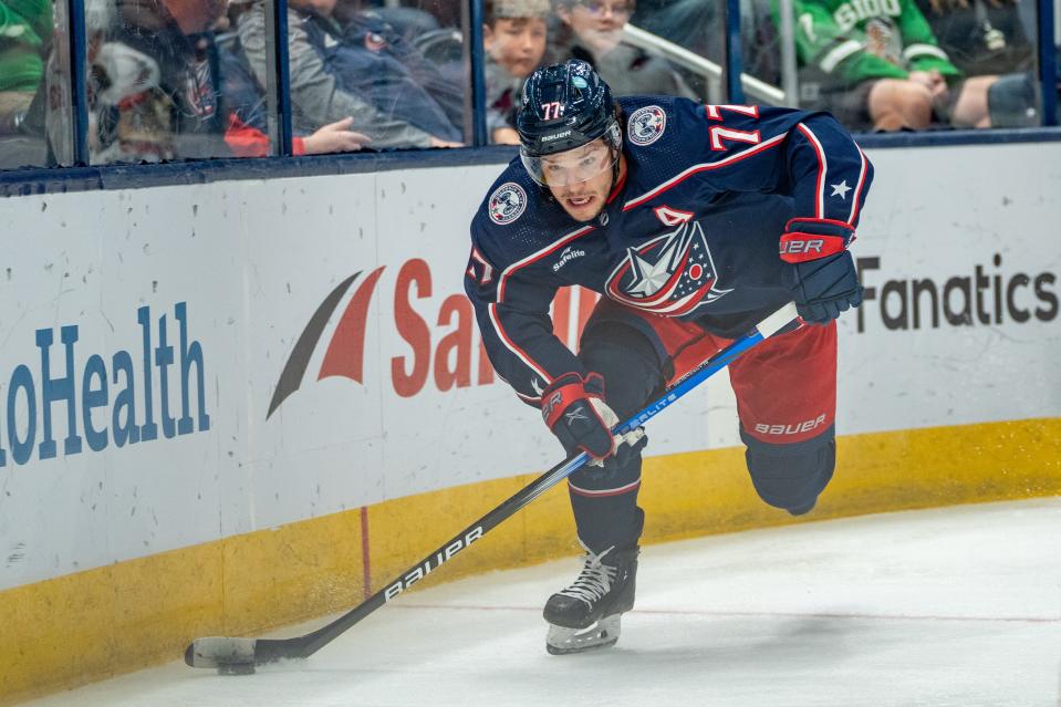 Oct. 5, 2023; Columbus, Ohio, United States;
Columbus Blue Jackets defenseman Nick Blankenburg (77) rushes around the rink with the puck during their game against the Washington Capitals on Thursday, Oct. 5, 2023 at Nationwide Arena.