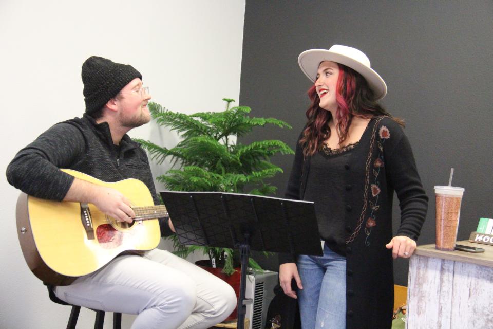 Grayden Lyon and Awna McCollom perform at Studio S during the Hometown Christmas event on Saturday, Dec. 4, 2021, in Dallas Center.