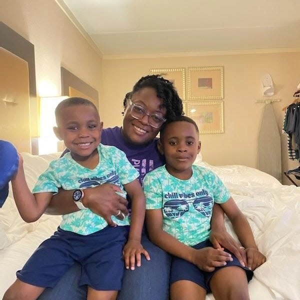 Destiny Huff and her two sons, 7 and 5. Huff's seven-year-old son was suspended three times within two weeks in the 2021-22 school year, an experience that she said traumatized her family.