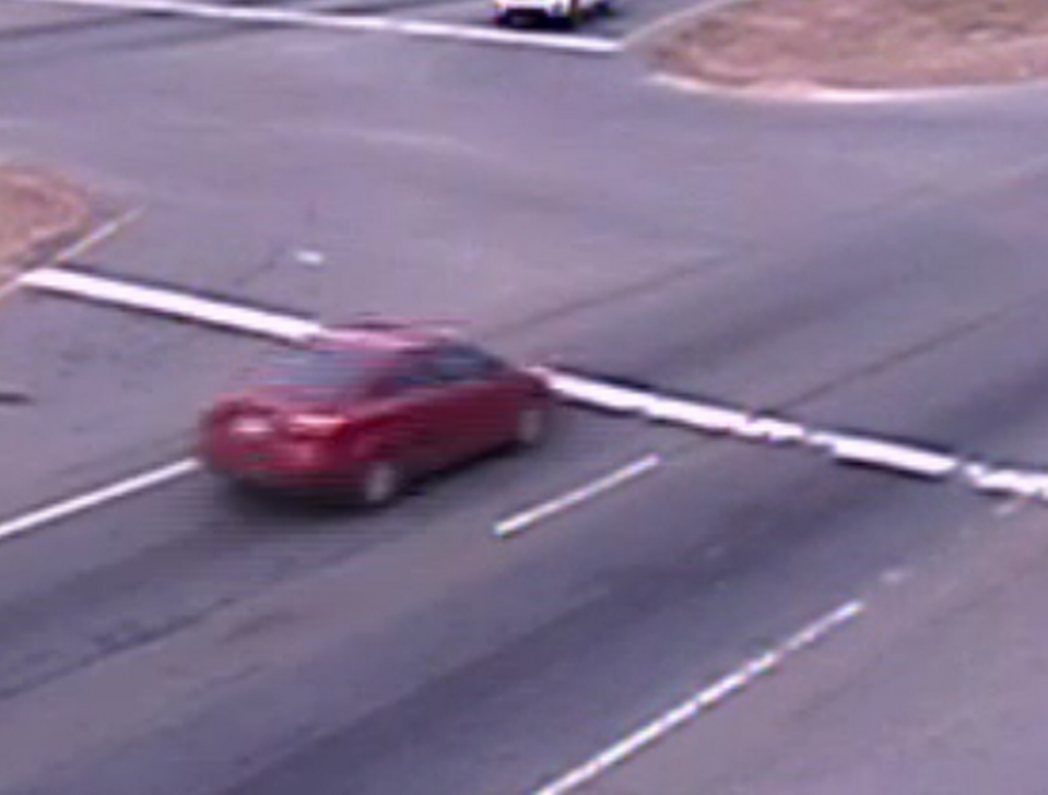 Charlotte-Mecklenburg police say the driver of this dark red 2014 to 2016 Kia Forte sedan hit and killed a man changing a tire along northbound Brookshire Boulevard on Friday, Jan. 22, 2021. 