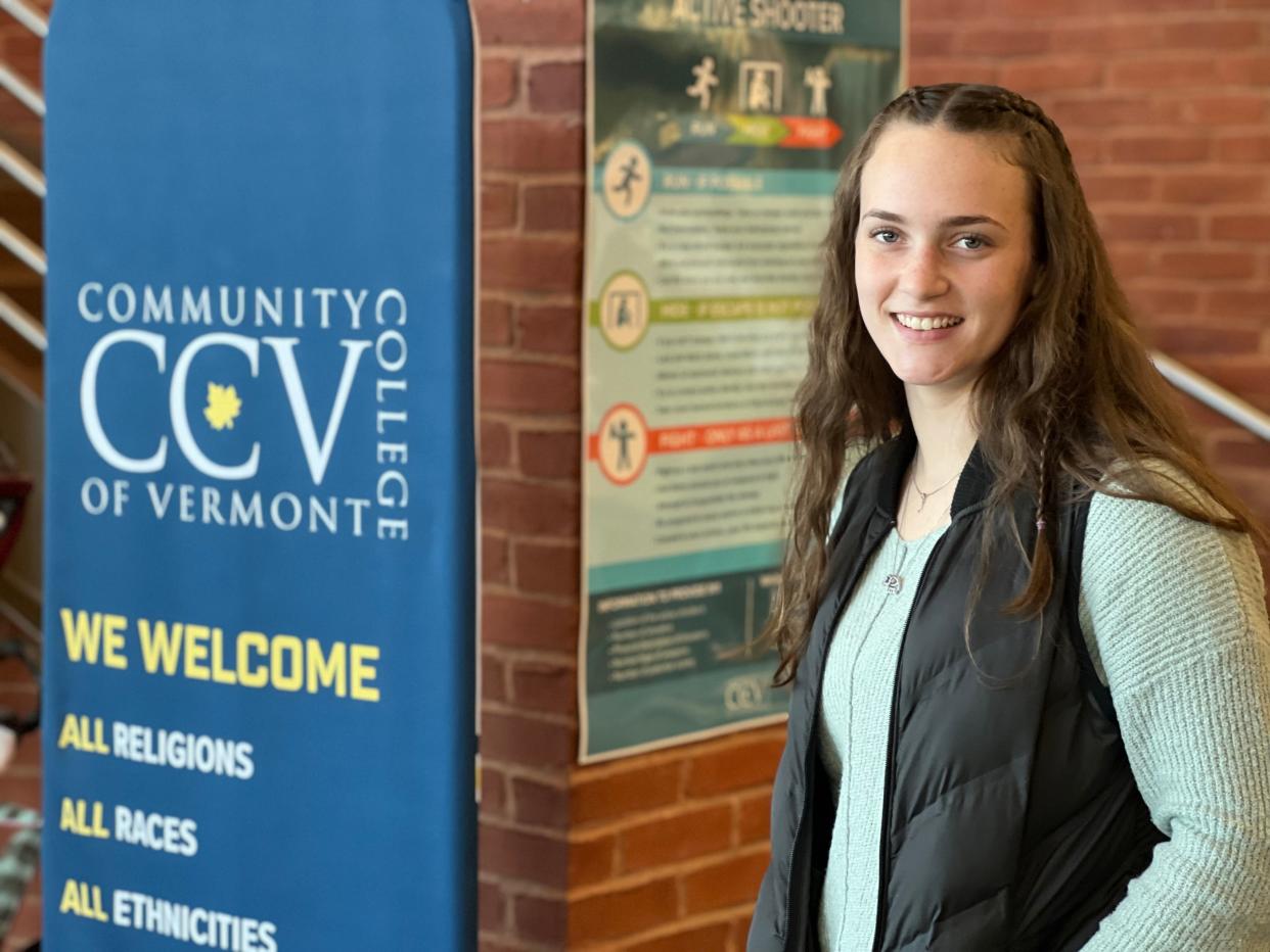 Aunika Higbee stands in the lobby of CCV Winooski on Nov. 2, 2023 where she takes four of her five college courses. She is a full-time college student while also completing her diploma as a senior at Colchester High School. She is enrolled in the Early College program and plans to go on to use the McClure Free Degree Promise next year, so she can earn an associate degree for free before transferring to a four-year college.