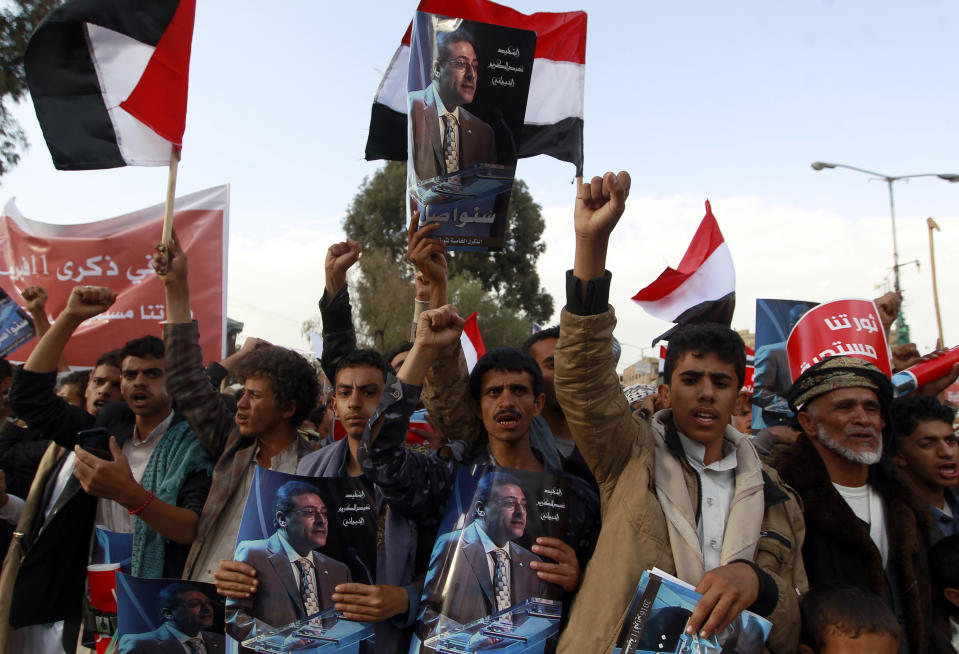 Supporters of the Shiite Huthi movement wave their national flag they shout slogans during a rally commemorating the fifth anniversary of the 2011 Arab Spring uprising that toppled the then-president Ali Abdullah Saleh, on February 11, 2016 in the capital Sanaa. / AFP / MOHAMMED HUWAIS        (Photo credit should read MOHAMMED HUWAIS/AFP/Getty Images)