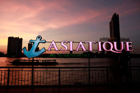 A tourist boat passes in the river near Asiatique night market, in Bangkok, Thailand April 23, 2019. REUTERS/Soe Zeya Tun