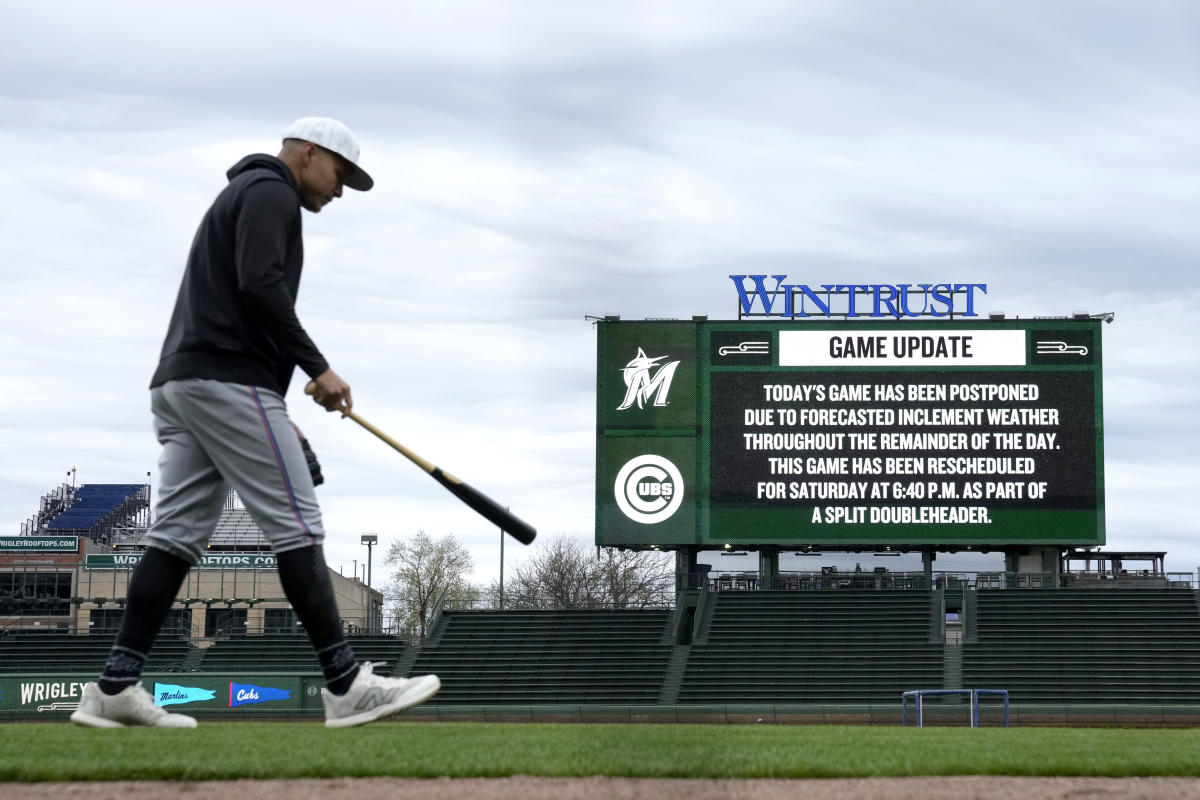 Miami Marlins at Chicago Cubs game postponed because of rain in the forecast