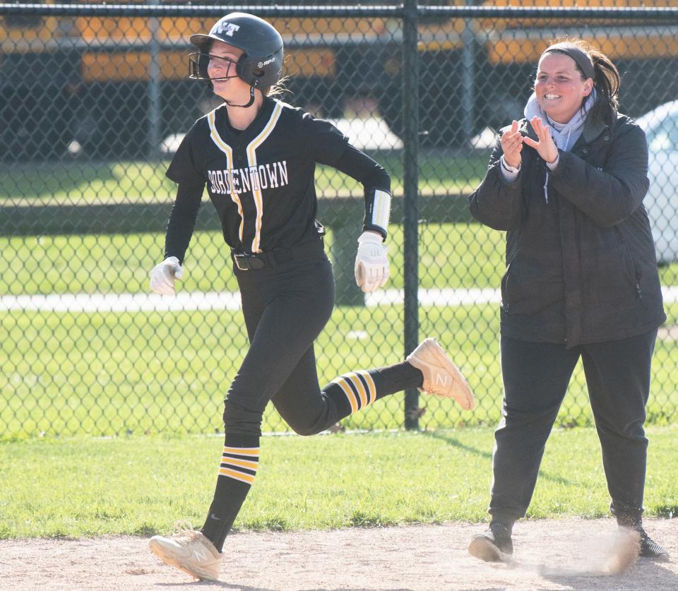 Bordentown's Brianna Fischer is applauded by Bordentown softball coach Rachel Gagliardo as Fischer rounds third base after hitting a 3-run home run during the 3rd inning of the softball game between Bordentown and Kingsway played at Kingsway Regional High School in Woolwich Township on Thursday, April 28, 2022.  Bordentown defeated Kingsway, 5-3.