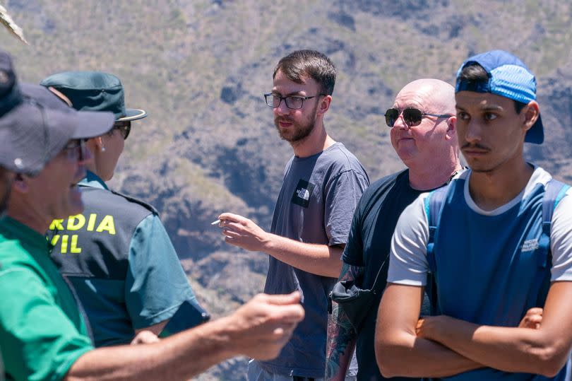 Teno Rural Park , near Masca, Tenerife.  The search for missing Brit  Jay Slater. His dad Warren and brother Zak join the search party in the search area in the valley below La Cruz de Hilda viewpoint.