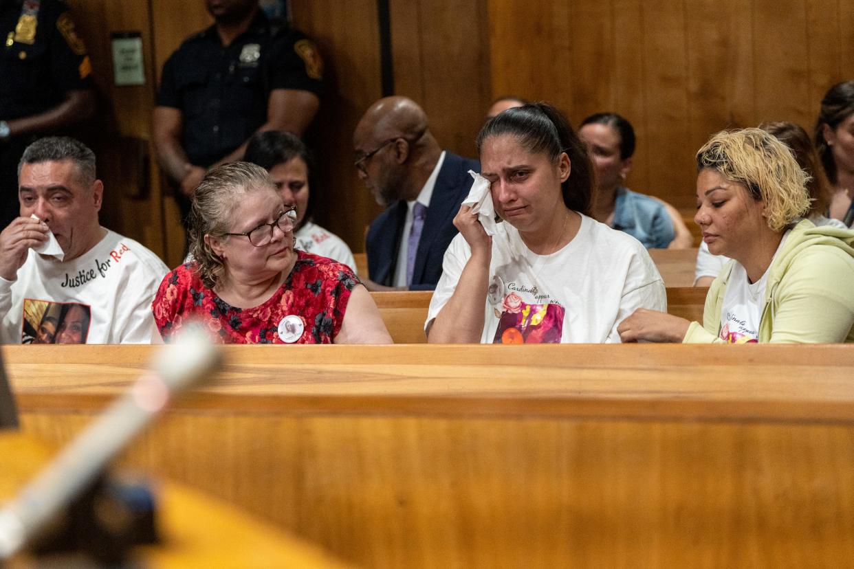 May 9, 2024; Paterson, N.J.; Family and friends of Stephanie DeJesus wipe away tears during the Justin Fisher sentencing at the Passaic County Courthouse on Thursday. Fisher, accused of killing Stephanie DeJesus, pleaded guilty to second-degree desecration of human remains and third-degree hindering apprehension in DeJesus' murder.