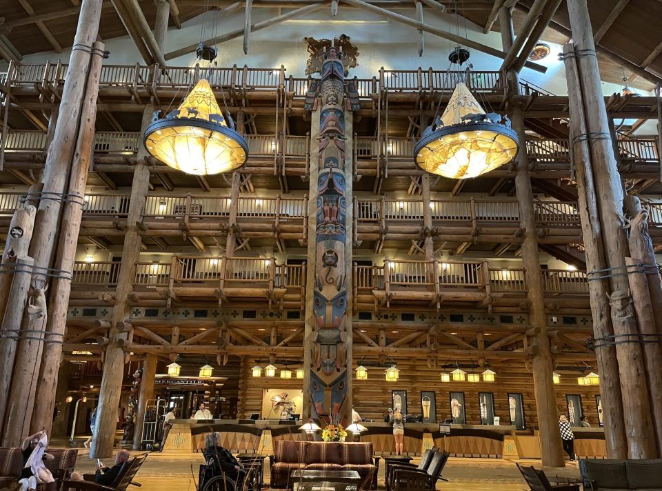 Wilderness Lodge lobby with lights and wood beams