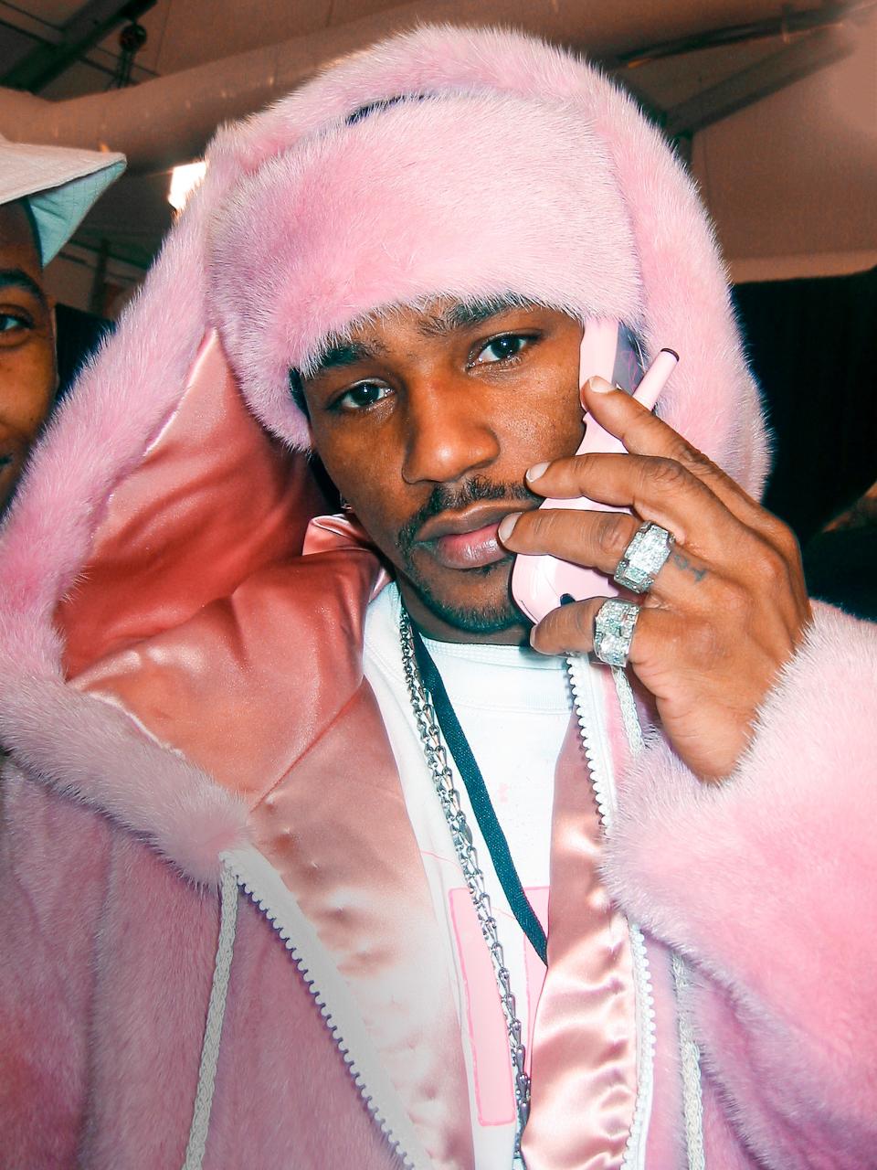 CAM'RON
Pink mink
New York City, 2003
The flip phone might look dated, but the pink mink makes this an iconic fit.