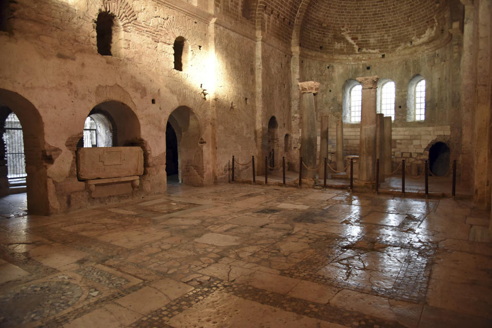 FILE - The 11th century Church of St. Nicholas is seen in in Demre, near Antalya, southern Turkey, Friday, Oct. 6, 2017. Turkish archaeologists believe they may have discovered the remains of St. Nicholas - from whom the legend of Santa Claus emerged - beneath a church at his birthplace in southern Turkey. Nicholas was born and served as a bishop of what is now the Turkish Mediterranean town of Demre, near Antalya, in the 4th century. (DHA-Depo Photos via AP, File)