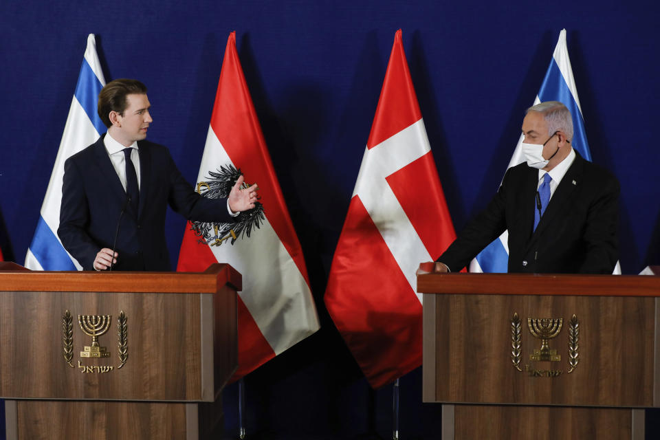 Israeli Prime Minister Benjamin Netanyahu, right, speaks during a joint statement with the Austrian Chancellor Sebastian Kurz, left, and the Danish Prime Minister Mette Frederiksen at the Israeli Prime minister office in Jerusalem on Thursday, March 4, 2021. (Olivier Fitoussi/Pool Photo via AP)