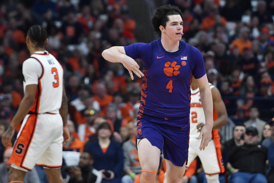 Clemson forward Ian Schieffelin (4) reacts during the second half of an NCAA college basketball game against Syracuse in Syracuse, N.Y., Saturday, Feb. 10, 2024. (AP Photo/Adrian Kraus)