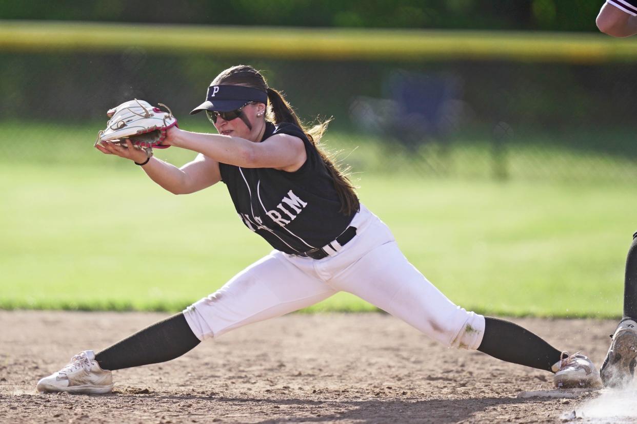 Pilgrim's Genna D'Amato stretches to make a play at first base during Tuesday's win over Prout.