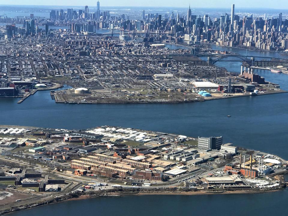 The Rikers Island Prison complex (foreground) is seen from an airplane in the Queens borough of New York City