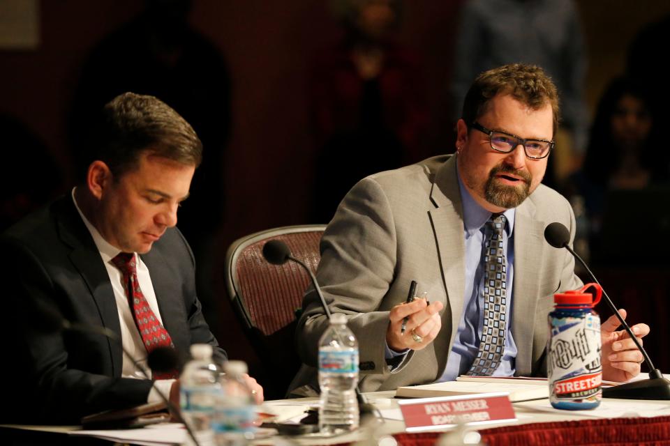 School board member Mike Moroski asks a question during a Cincinnati Public Schools Board of Education weekly meeting in Avondale on Feb. 12, 2018.