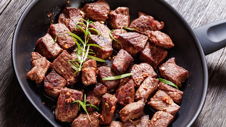 beef cubes in a pan