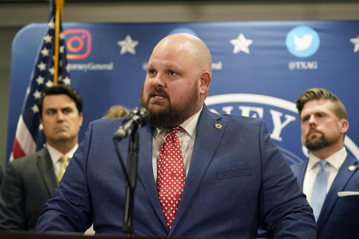 Assistant Texas state Attorney General Christopher Hilton makes a statement at his office in Austin, Texas, Friday, May 26, 2023. An investigating committee says the Texas House of Representatives will vote Saturday on whether to impeach state Attorney General Ken Paxton. (AP Photo/Eric Gay)