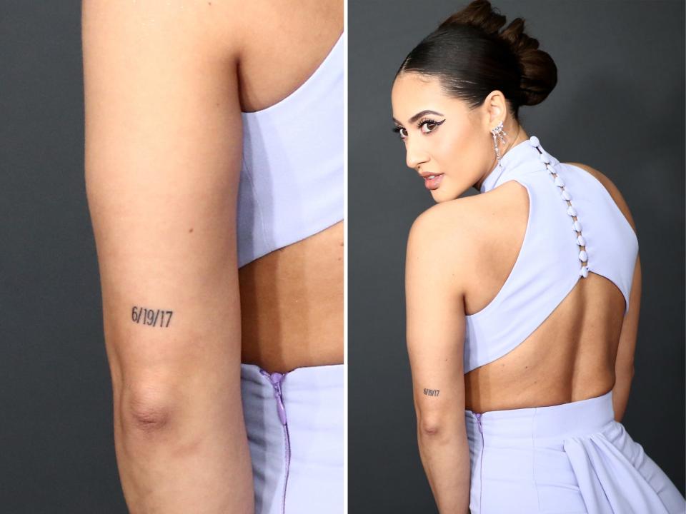 Francia Raisa shows off her 6/19/17 tattoo at the NAACP Image Awards in 2020.
