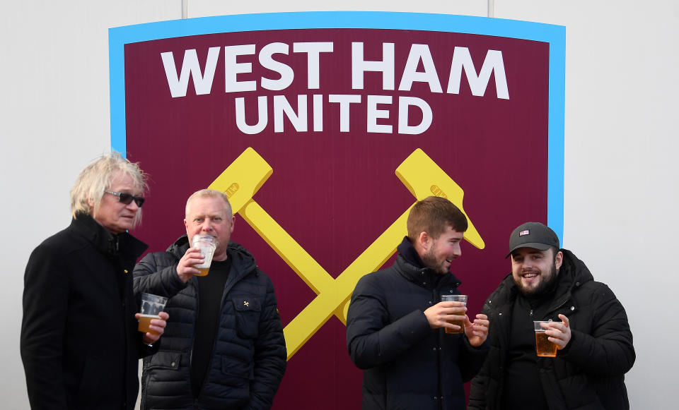 Fans outside the ground before the Premier League match at London Stadium. (Photo by Victoria Jones/PA Images via Getty Images)