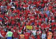 <p>Fans hold banners as they wait for Arsenal’s French manager Arsene Wenger to do his lap of honor after the English Premier League soccer match between Arsenal and Burnley at the Emirates Stadium in London, Sunday, May 6, 2018. The match is Arsenal manager Arsene Wenger’s last home game in charge after announcing in April he will stand down as Arsenal coach at the end of the season after nearly 22 years at the helm. (AP Photo/Matt Dunham) </p>