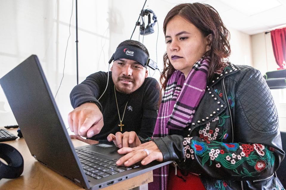Rubi Guadarrama, 26, MA Neuroscience student, and volunteer and Sports Management & Mass Communication student David Reyes, 26, analyze the results of Reyes' Memory Maze Task test in Goodman Lab, located at Longwood Hall of Delaware State University's Downtown Campus on Tuesday, Nov. 22, 2022.