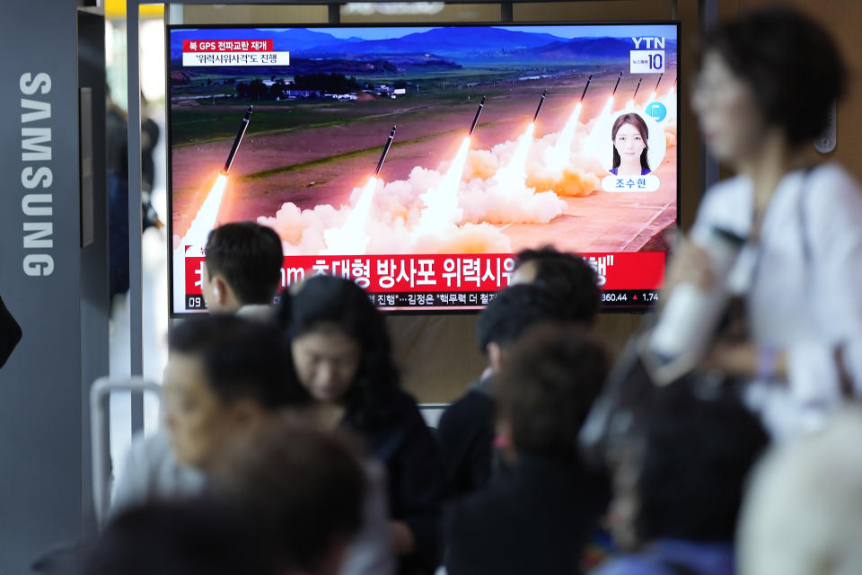 A TV screen shows a report of North Korea's multiple rocket launchers during a news program at the Seoul Railway Station in Seoul, South Korea, Friday, May 31, 2024. North Korean leader Kim Jong Un supervised firing drills involving nuclear-capable "super-large" multiple rocket launchers to show the country's ability to carry out preemptive attacks on rival South Korea, state media reported Friday. The letters read "North, super-large multiple rocket." (AP Photo/Lee Jin-man)